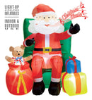 Light-Up Airblown Inflatable Santa Claus Seated On Sofa With Presents Animated Head & Music  122 Cm