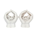 Set of Two Small Shelter 7cm Baby in Cradled Hands Figurines
